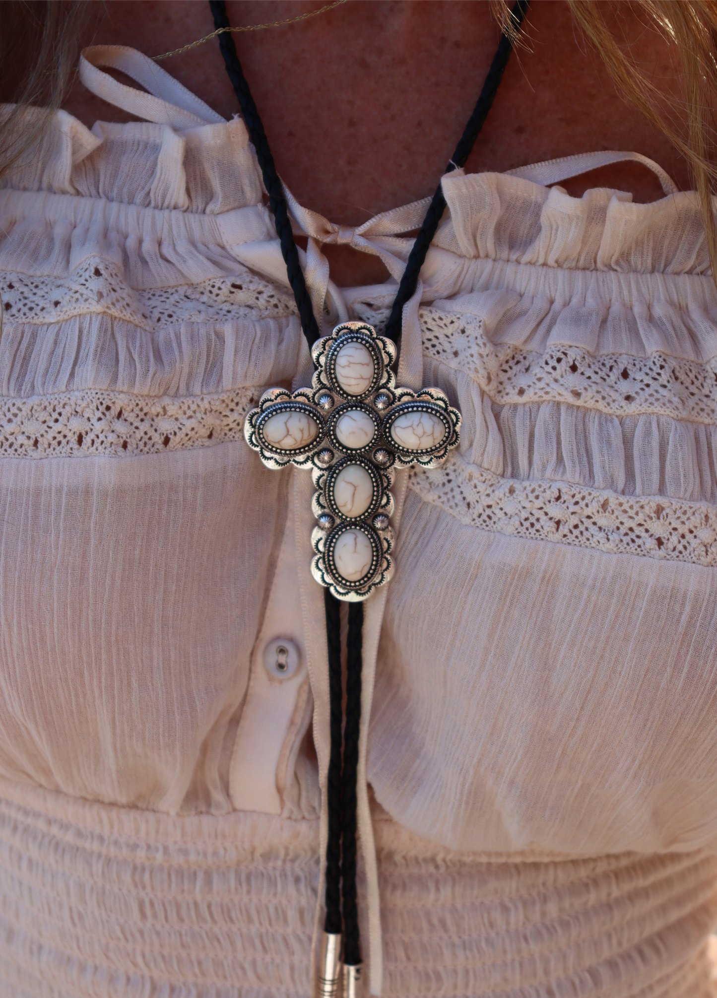 White gems cross Bolo tie