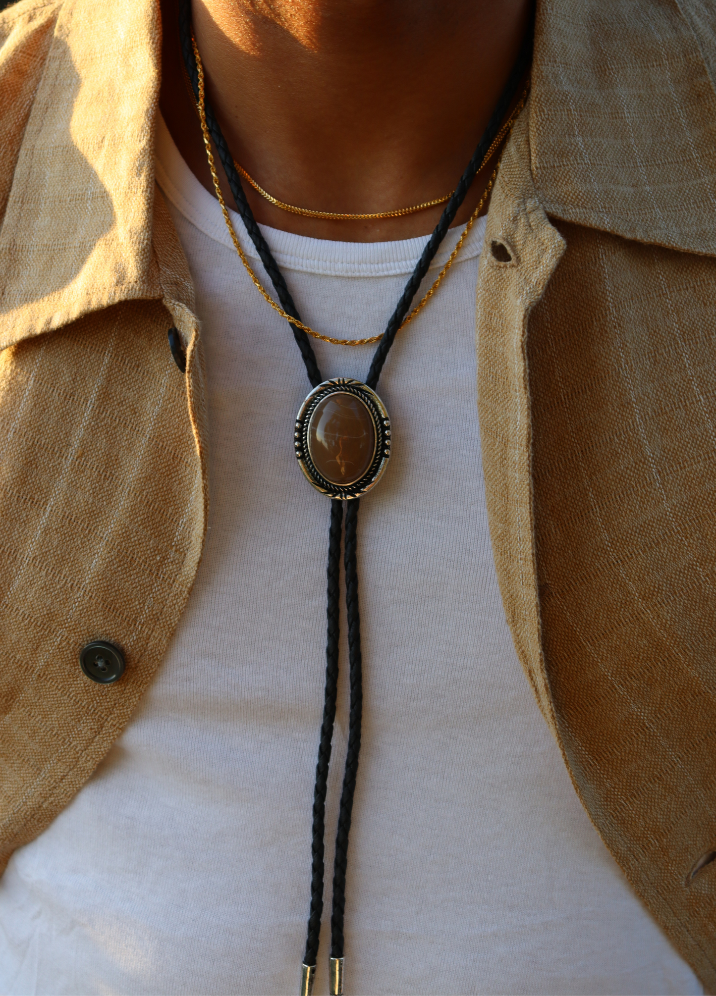 Brown aye Bolo tie